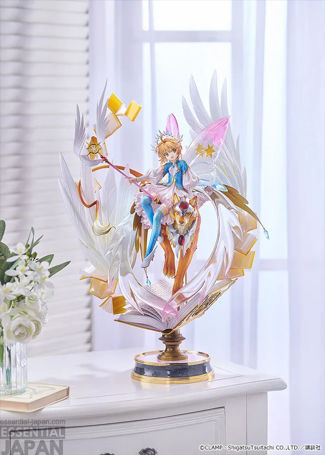 Side view of the Sakura and Cerberus statue with the illuminated base.